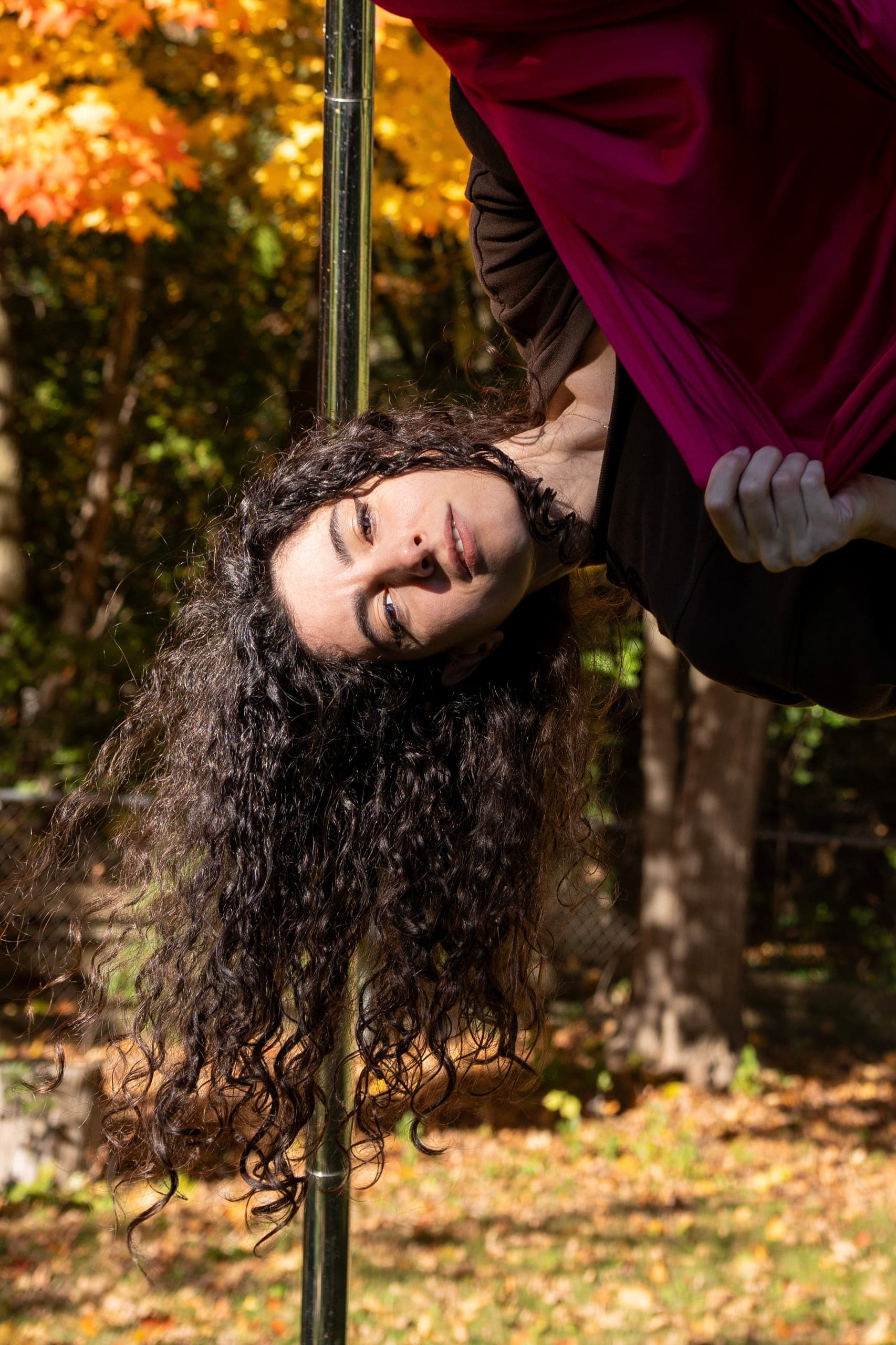 Linda in a supported yin aerial stretch