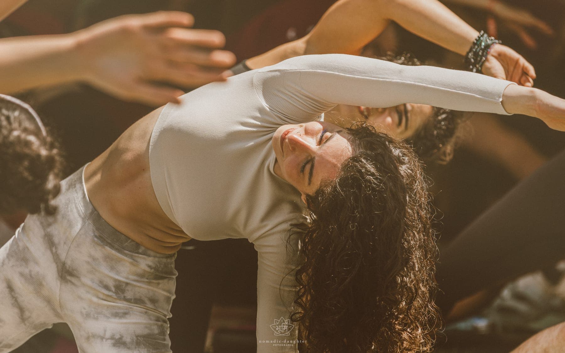 Linda in a flowing backbend during a group dance session